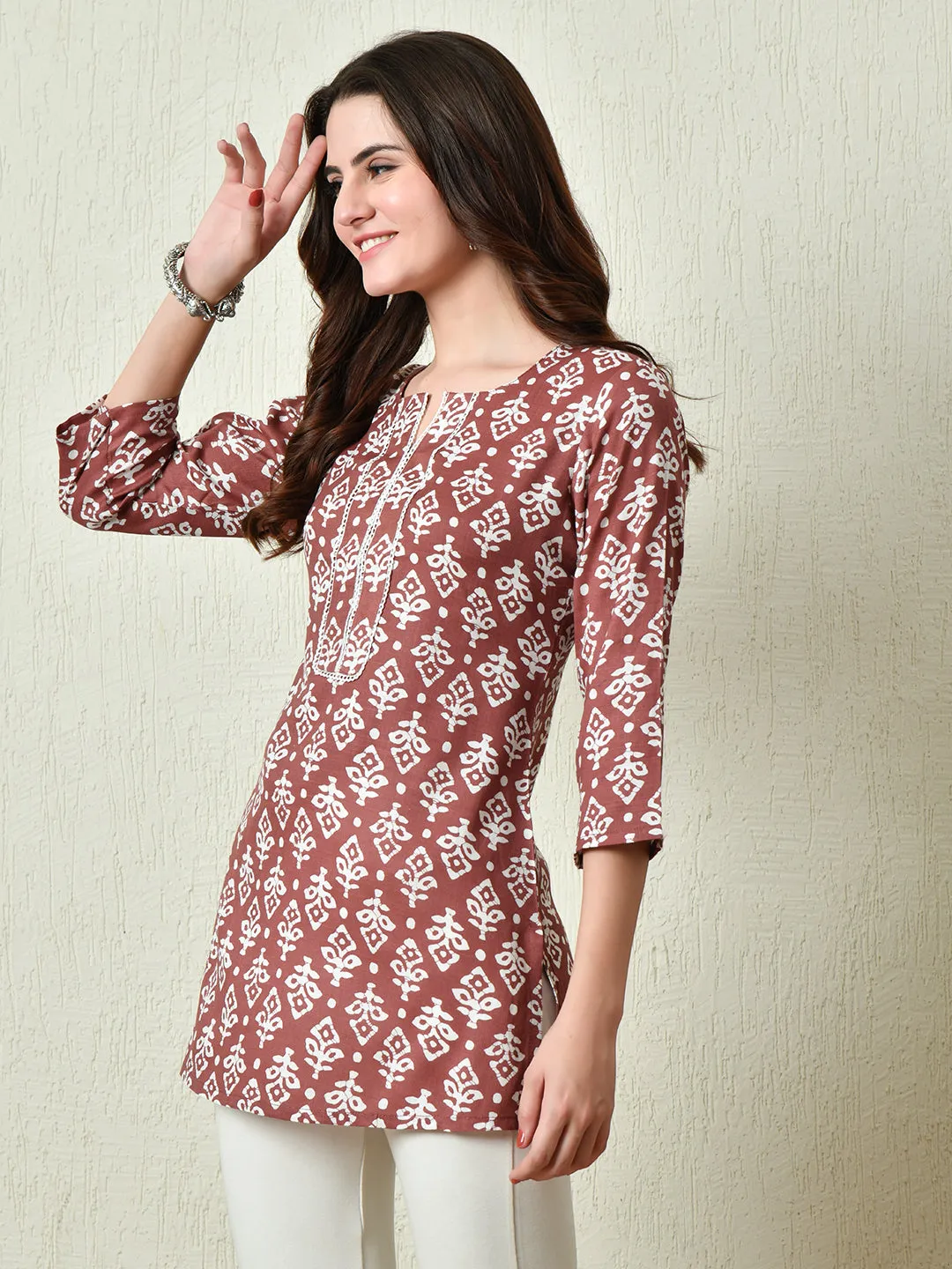 Women Stylish Maroon Cotton Short Kurti With Elegant Print