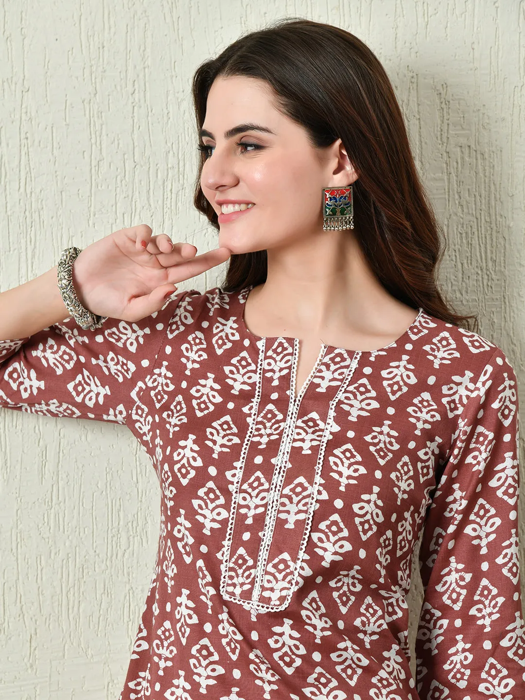 Women Stylish Maroon Cotton Short Kurti With Elegant Print